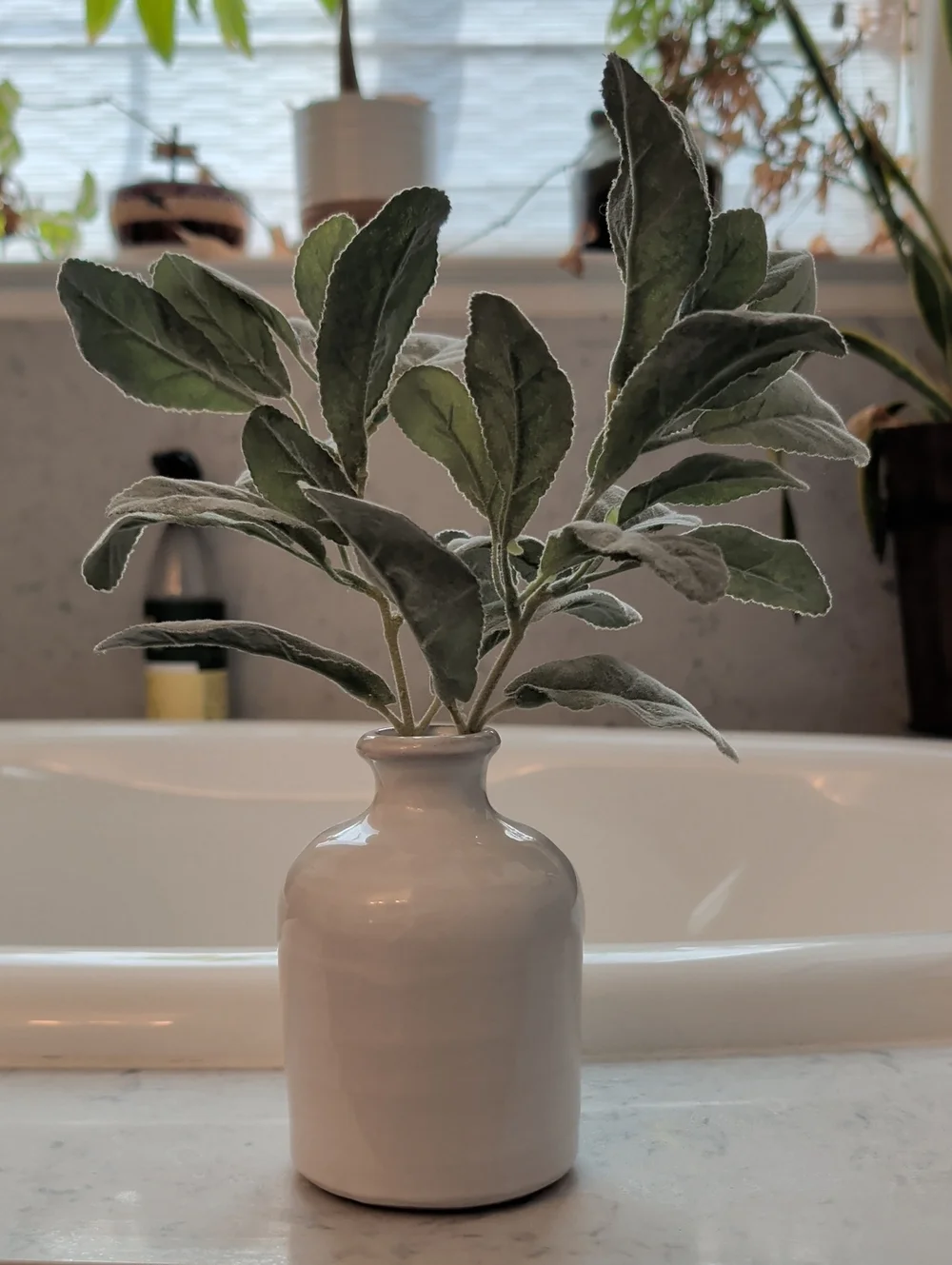 White Ceramic Bud Vase with Green Faux Foliage -